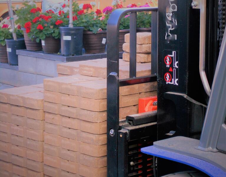 Forklift handling materials on site